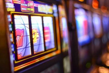 luxury12 mobile app home screen showing sportsbook, live dealer, and slot game options
